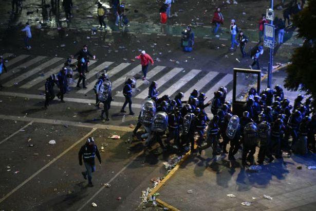 Argentina Fans Clash with Police in Riots Following World Cup Defeat