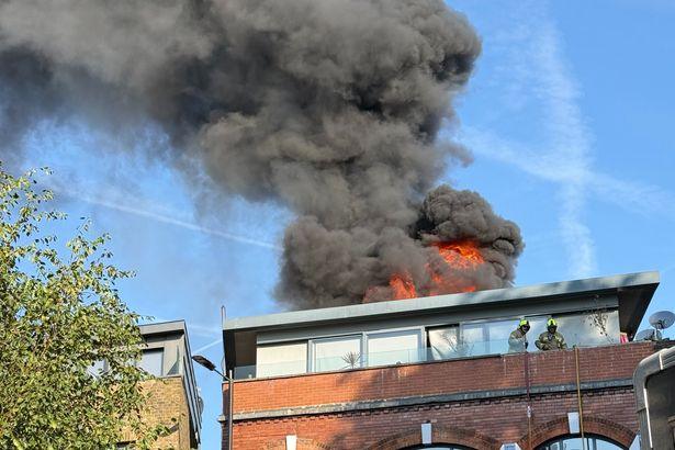 Firefighters Tackle Blaze in Shoreditch Penthouse as Thick Black Smoke Veils London Skyline Latest Update